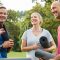 Mature fitness friends talking